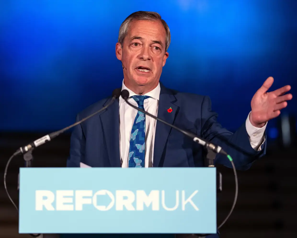 Nigel Farage Reform UK tax cut U-turn